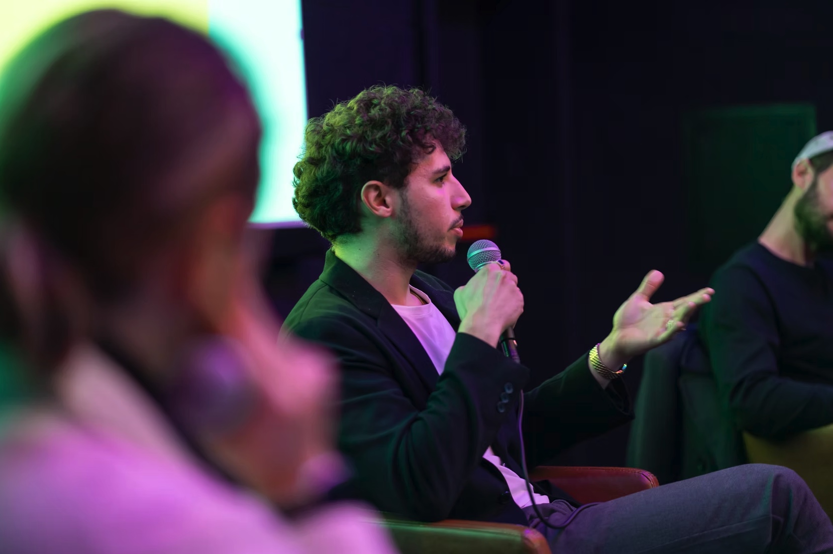 Gianluca Boccadifuoco speaking on a panel about art and technology